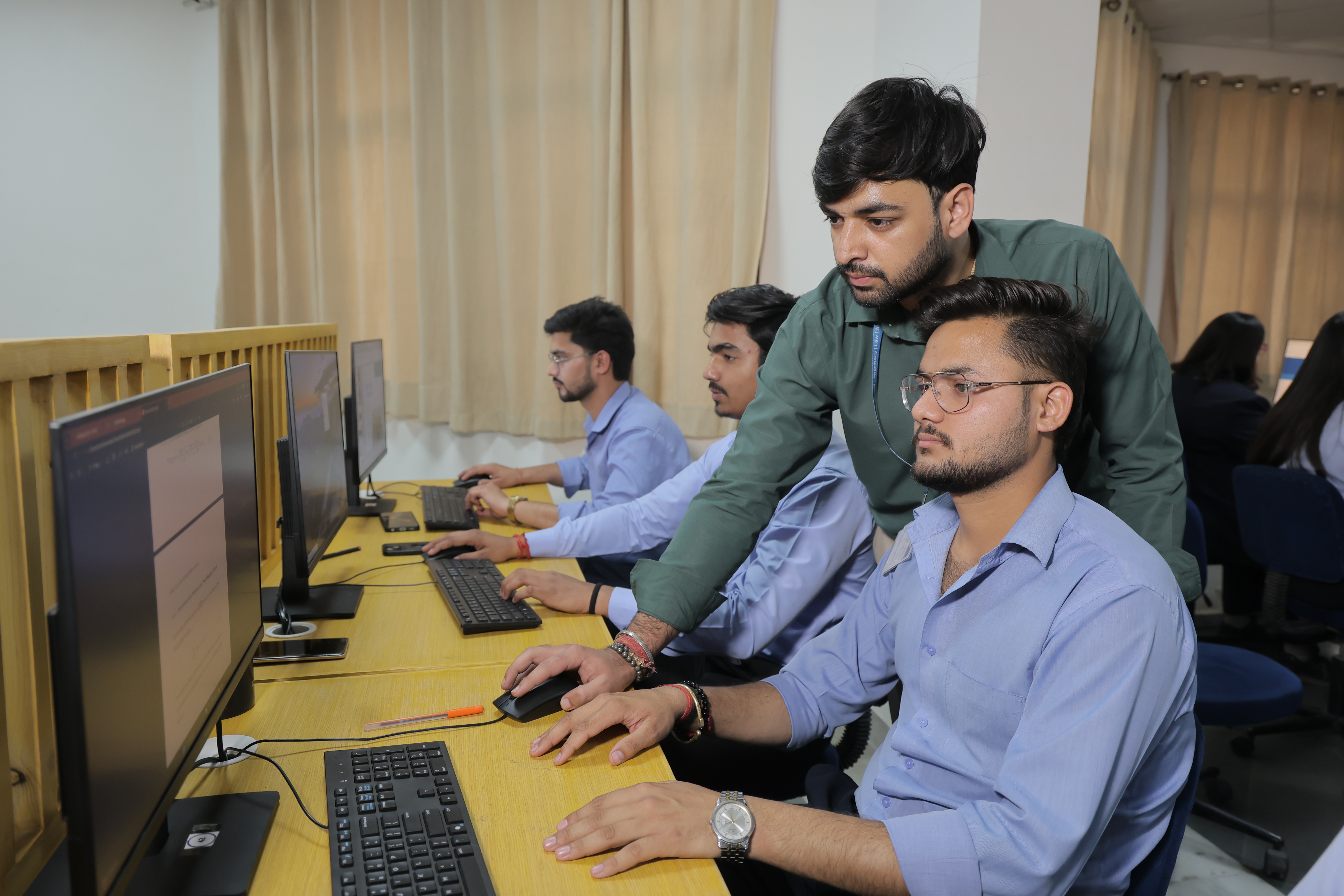 Students with faculty supervision in lab