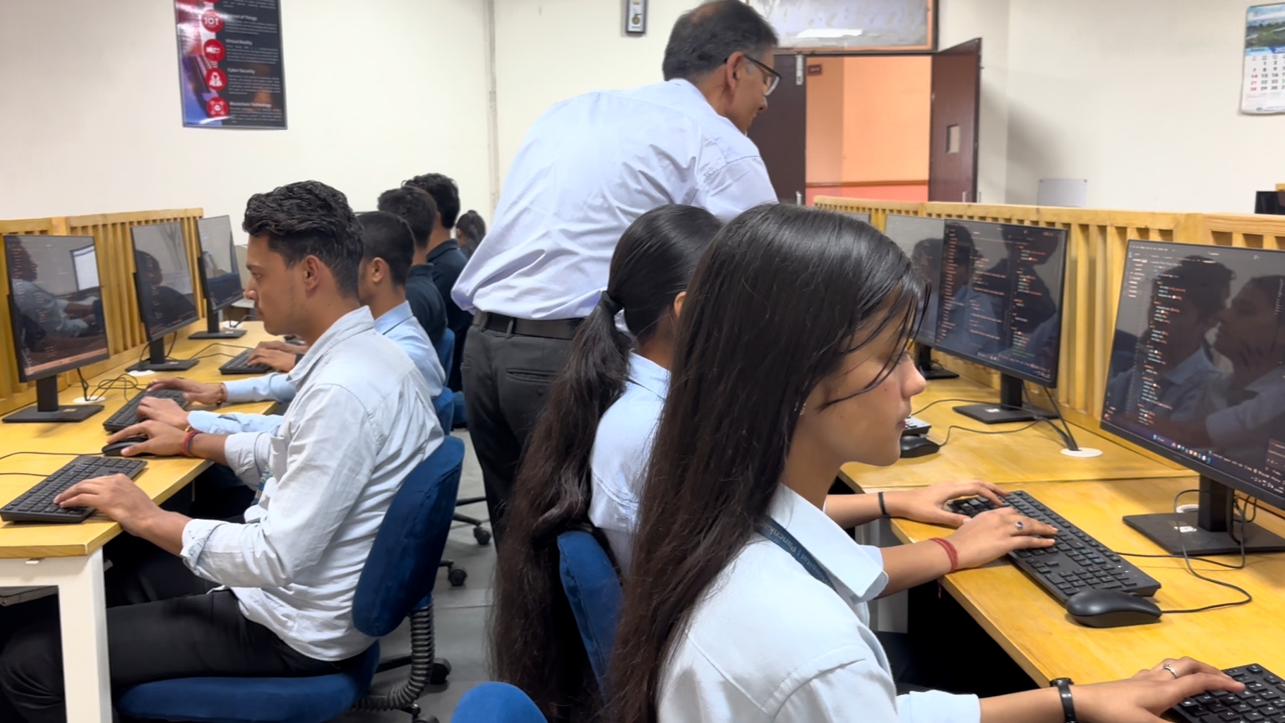 Faculty supervising lab session